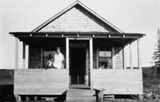 Dr. Mary Percy Jackson at provincial district doctor's cottage, Notikewin, AB, ca. 1925. Source: Glenbow Museum