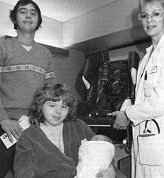 Dr. Linda Storoz with New Year's baby Sherry Anne Scott and her parents in Fort McMurray. Photo from Alberta Doctors' Digest, Jan./Feb. 1987.