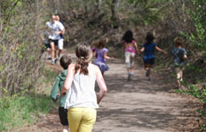 Children participate in the AMA Youth Run Club