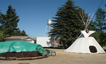Sweat lodge and teepee in Alberta. Photo by Marty Landrie, Indigenous Health Committee.