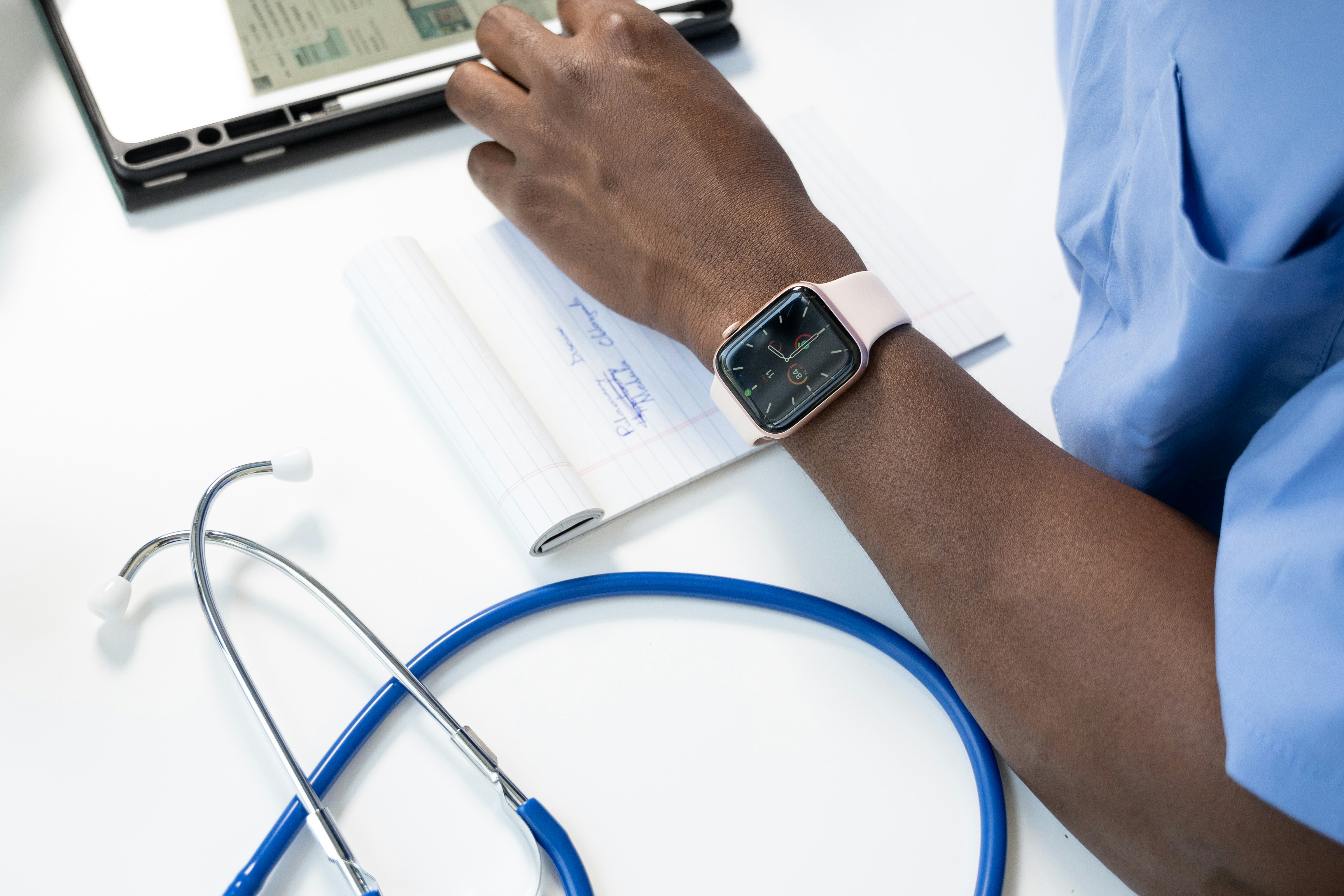 Doctor working with tablet beside medical equipment Doctor working with tablet beside medical equipment